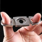Compact folding pocket scissors for premium cigar cutting.
